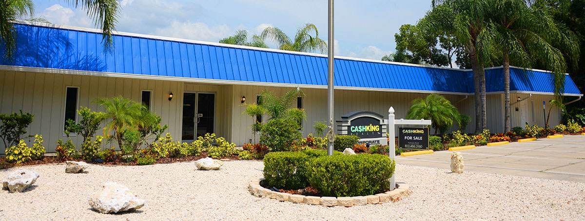 The Cash King Realty office building and signage
